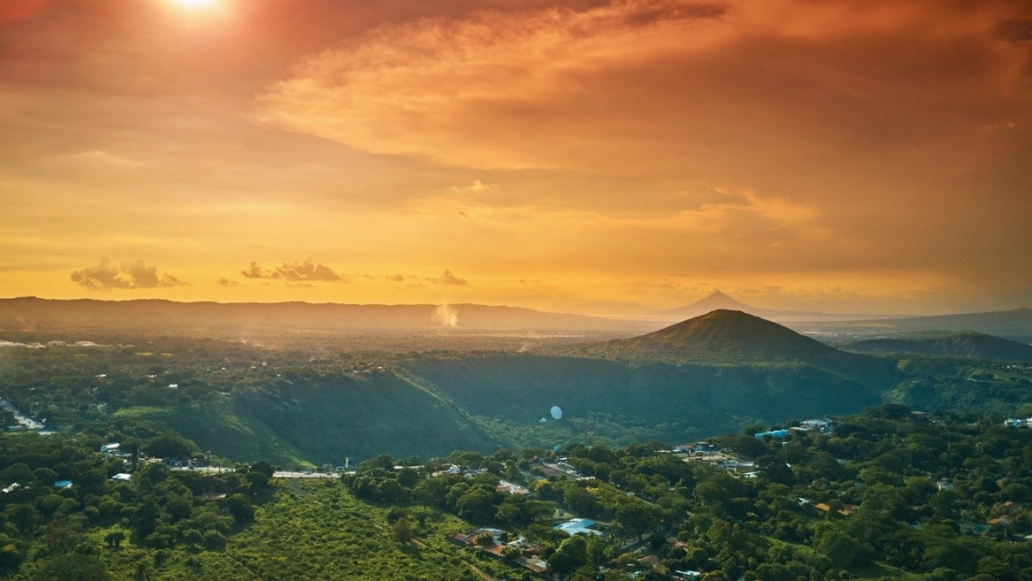 Nicaragua landscape at dawn with a volcano on the background